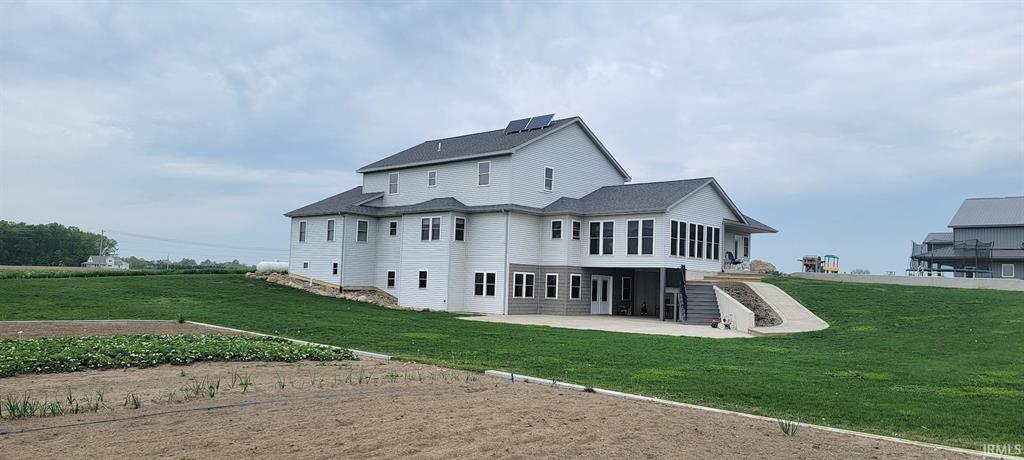Rear view of home at 5499 State Road 1 Saint Joe Indiana auction