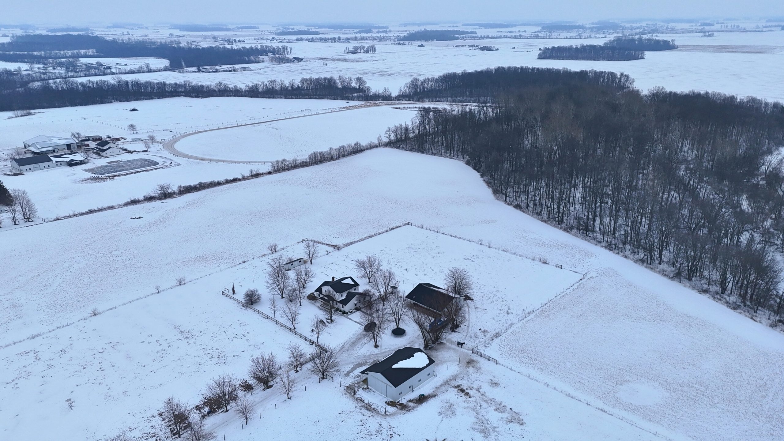 Snow aerial property view at 4386 E 300 S Monroe Indiana auction
